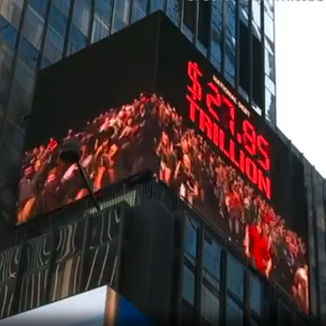 “定时炸弹”惊现纽约时代广场LED巨屏：美国债务巨雷在屏上滴答作响！